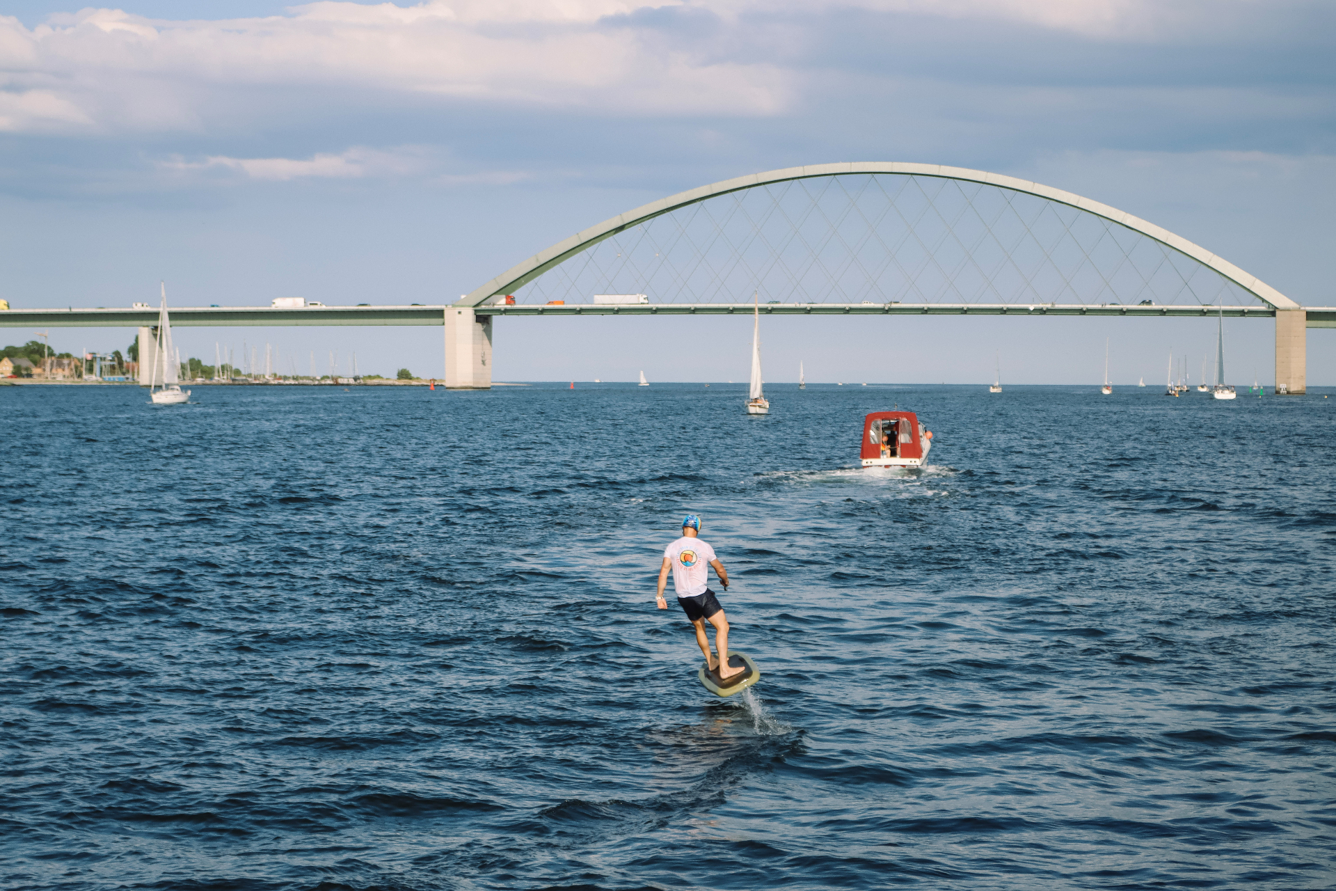 E-foiling on the Baltic Sea with the Fehmarn Bridge in the background